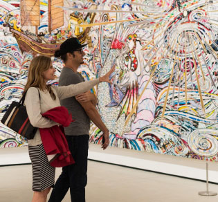 couple viewing an artwork